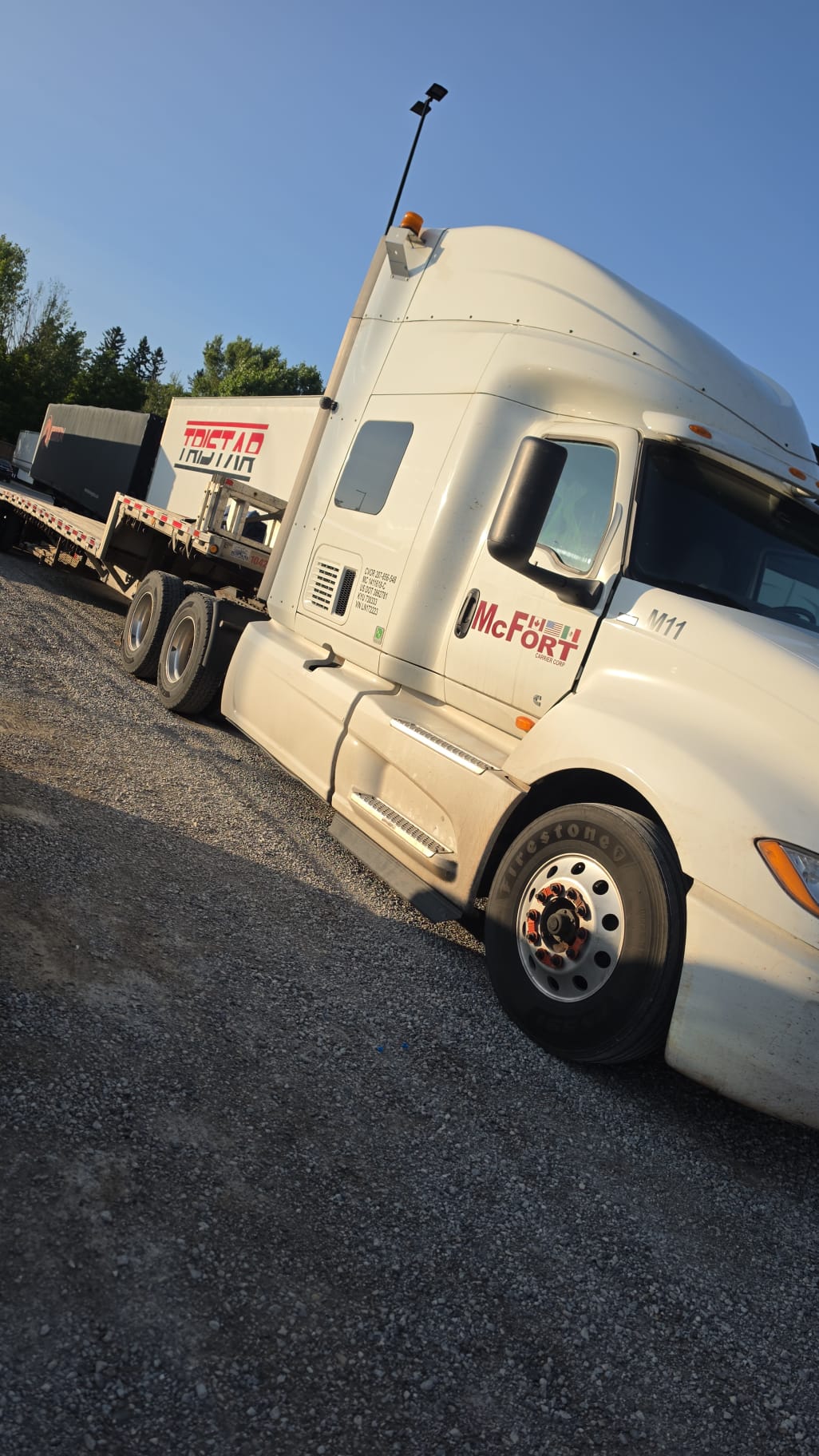 M11 International · step deck haul