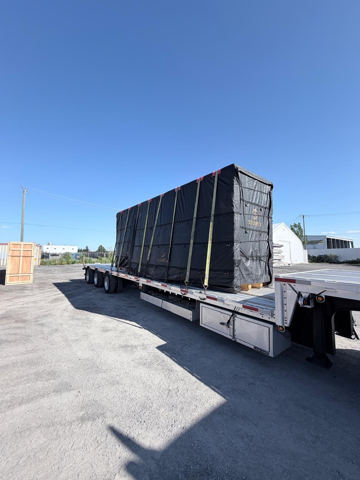 Tarped freight · secured step deck